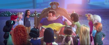 Movie still from “Ralph Breaks the Internet” (2018), directed by Rich Moore – A group of people gathered around a man in a bed; Wide shot, Over the shoulder angle