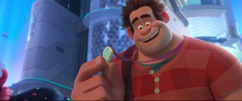Movie still from “Ralph Breaks the Internet” (2018), directed by Rich Moore – A person holding a piece of food in his hand; Close Up shot, Over the shoulder angle