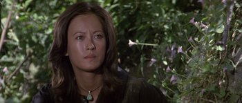 Movie still from “Rambo: First Blood Part II” (1985), directed by George P. Cosmatos – A person wearing a necklace; Close Up shot, Low angle