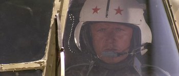 Movie still from “Rambo: First Blood Part II” (1985), directed by George P. Cosmatos – A person wearing a helmet; Close Up shot, Low angle