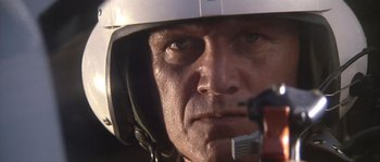 Movie still from “Rambo: First Blood Part II” (1985), directed by George P. Cosmatos – A person wearing a helmet; Close Up shot, Low angle