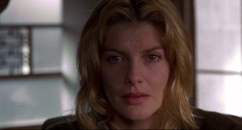 Movie still from “Ransom” (1996), directed by Ron Howard – A person with long hair; Close Up shot, High angle