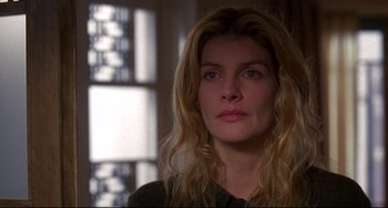 Movie still from “Ransom” (1996), directed by Ron Howard – A person with long blonde hair; Close Up shot, Over the shoulder angle