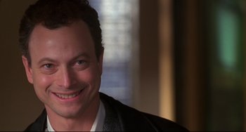 Movie still from “Ransom” (1996), directed by Ron Howard – A person wearing a jacket; Close Up shot, Over the shoulder angle