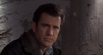 Movie still from “Ransom” (1996), directed by Ron Howard – A person wearing a jacket; Close Up shot, Low angle