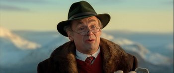 Movie still from “Rare Exports” (2010), directed by Jalmari Helander – An older man wearing a hat and a fur coat; Close Up shot, Low angle
