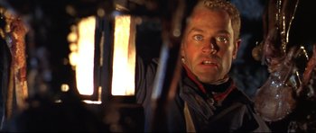 Movie still from “Ravenous” (1999), directed by Antonia Bird – A person looking at the camera; Close Up shot, Low angle