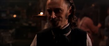 Movie still from “Ravenous” (1999), directed by Antonia Bird – A person with long hair; Close Up shot, Over the shoulder angle