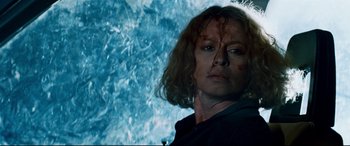 Movie still from “Razorback” (1984), directed by Russell Mulcahy – A person in a dark room; Close Up shot, Low angle