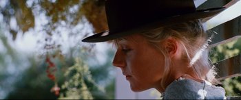 Movie still from “Razorback” (1984), directed by Russell Mulcahy – A person wearing a hat; Close Up shot, Low angle