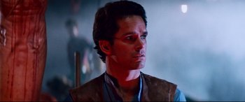 Movie still from “Razorback” (1984), directed by Russell Mulcahy – A person wearing a jacket; Close Up shot, Low angle