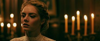 Movie still from “Ready or Not” (2019), directed by Matt Bettinelli-Olpin – A person wearing a white dress; Close Up shot, Over the shoulder angle