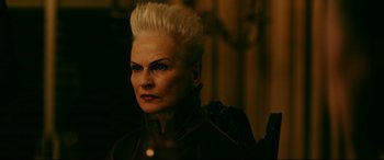 Movie still from “Ready or Not” (2019), directed by Matt Bettinelli-Olpin – An older woman with white hair looking at the camera; Close Up shot, Over the shoulder angle