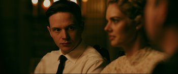 Movie still from “Ready or Not” (2019), directed by Matt Bettinelli-Olpin – A man and a woman sitting next to each other; Close Up shot, Over the shoulder angle
