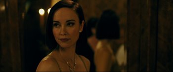 Movie still from “Ready or Not” (2019), directed by Matt Bettinelli-Olpin – A person wearing a necklace; Close Up shot, Over the shoulder angle