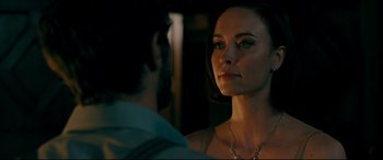 Movie still from “Ready or Not” (2019), directed by Matt Bettinelli-Olpin – A man and a woman looking at one another; Close Up shot, Over the shoulder angle