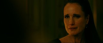 Movie still from “Ready or Not” (2019), directed by Matt Bettinelli-Olpin – A person wearing a black shirt; Close Up shot, Over the shoulder angle