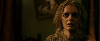 Movie still from “Ready or Not” (2019), directed by Matt Bettinelli-Olpin – A person with a face covered in makeup; Close Up shot, Low angle