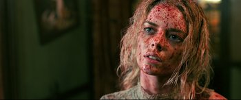 Movie still from “Ready or Not” (2019), directed by Matt Bettinelli-Olpin – A person with blood all over her face; Close Up shot, Low angle