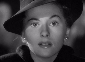 Movie still from “Rebecca” (1940), directed by Alfred Hitchcock – A person wearing a hat; Close Up shot, High angle