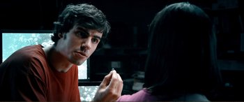Movie still from “Hostage 911” (2018), directed by Robert Rodriguez – A man looking at a woman in a mirror; Close Up shot, Over the shoulder angle