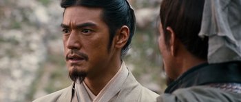 Movie still from “Red Cliff” (2008), directed by John Woo – A person with a beard; Close Up shot, Over the shoulder angle