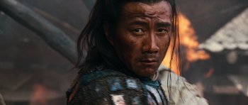 Movie still from “Red Cliff” (2008), directed by John Woo – A person with long black hair; Close Up shot, Low angle