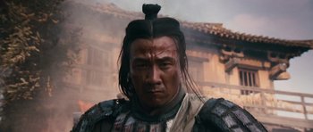 Movie still from “Red Cliff” (2008), directed by John Woo – A person wearing a costume; Close Up shot, Low angle