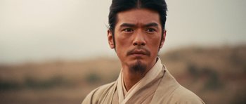 Movie still from “Red Cliff” (2008), directed by John Woo – A person wearing a robe; Close Up shot, Low angle