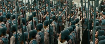 Movie still from “Red Cliff” (2008), directed by John Woo – A group of men standing next to each other; Wide shot, High angle