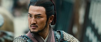 Movie still from “Red Cliff” (2008), directed by John Woo – A person wearing a costume; Close Up shot, Low angle