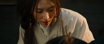 Movie still from “Red Cliff” (2008), directed by John Woo – A person wearing a robe; Close Up shot, Over the shoulder angle