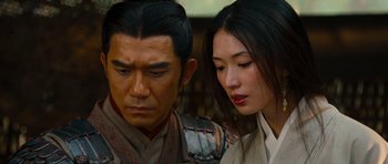 Movie still from “Red Cliff” (2008), directed by John Woo – A man and a woman looking at one another; Close Up shot, Over the shoulder angle