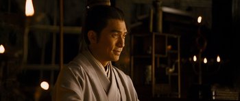 Movie still from “Red Cliff” (2008), directed by John Woo – A man in a white robe is looking into the distance; Close Up shot, Over the shoulder angle