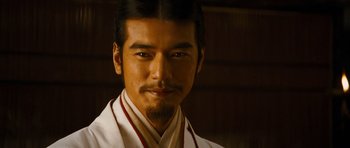 Movie still from “Red Cliff” (2008), directed by John Woo – A person wearing a robe; Close Up shot, Low angle