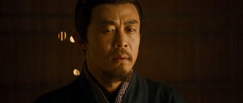 Movie still from “Red Cliff” (2008), directed by John Woo – A person with a beard; Close Up shot, Low angle