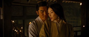 Movie still from “Red Cliff” (2008), directed by John Woo – A man and a woman in traditional japanese clothing; Close Up shot, Low angle