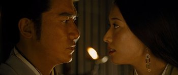 Movie still from “Red Cliff” (2008), directed by John Woo – A man and a woman looking at each other; Close Up shot, Low angle