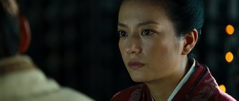 Movie still from “Red Cliff” (2008), directed by John Woo – A person wearing a scarf; Close Up shot, Over the shoulder angle