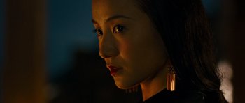 Movie still from “Red Cliff” (2008), directed by John Woo – A woman's face at night; Close Up shot, Low angle