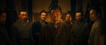 Movie still from “Red Cliff” (2008), directed by John Woo – A group of men standing next to each other; Medium shot, Over the shoulder angle