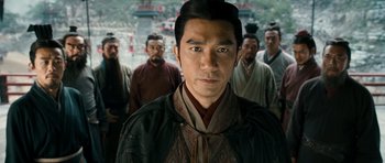 Movie still from “Red Cliff” (2008), directed by John Woo – A group of men standing next to each other; Medium shot, Over the shoulder angle