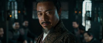 Movie still from “Red Cliff” (2008), directed by John Woo – A person with a beard; Close Up shot, Over the shoulder angle