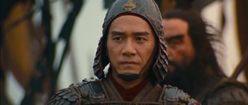 Movie still from “Red Cliff” (2008), directed by John Woo – A man wearing a helmet and a suit of armor; Close Up shot, Low angle