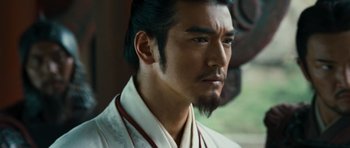 Movie still from “Red Cliff” (2008), directed by John Woo – A person with a beard; Close Up shot, Low angle