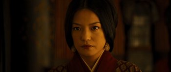 Movie still from “Red Cliff” (2008), directed by John Woo – A person wearing a dress; Close Up shot, Over the shoulder angle