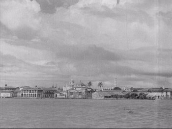 Movie still from “Redes” (1936), directed by Fred Zinnemann – A black and white photo of a city; Extreme Wide shot, High angle