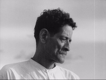 Movie still from “Redes” (1936), directed by Fred Zinnemann – Black and white photograph of a man with curly hair; Close Up shot, Low angle