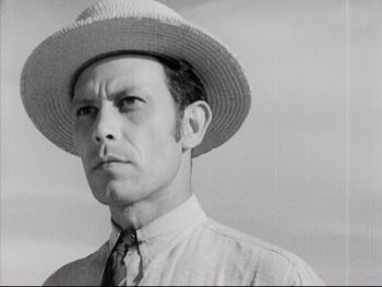 Movie still from “Redes” (1936), directed by Fred Zinnemann – A black and white photo of a man wearing a straw hat; Close Up shot, Low angle