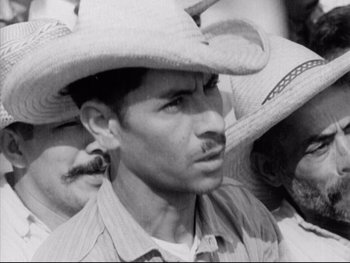 Movie still from “Redes” (1936), directed by Fred Zinnemann – A black and white photo of a man wearing a cowboy hat; Close Up shot, High angle